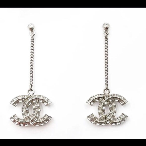CHANEL Jewelry - Silver CHANEL dangle earrings
